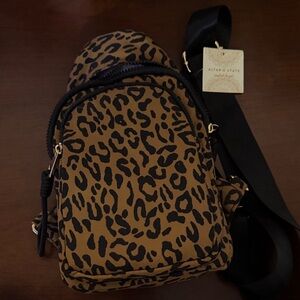 Altar'd State Brown Leopard sling backpack
